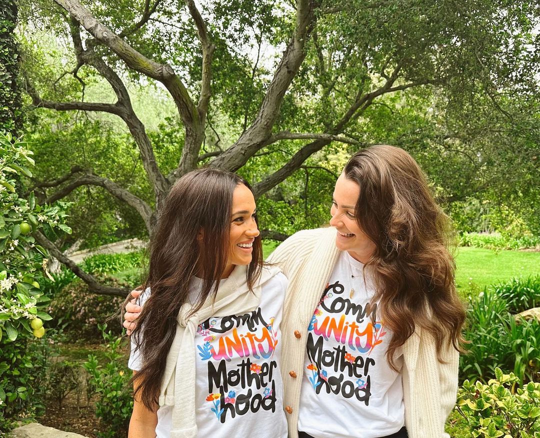 The Duchess of Sussex appeared alongside Kelly McKee Zajfen, co-founder of Alliance of Moms, who posted a photo of herself and Meghan Markle wearing Community Motherhood shirts on Mother's Day 2023