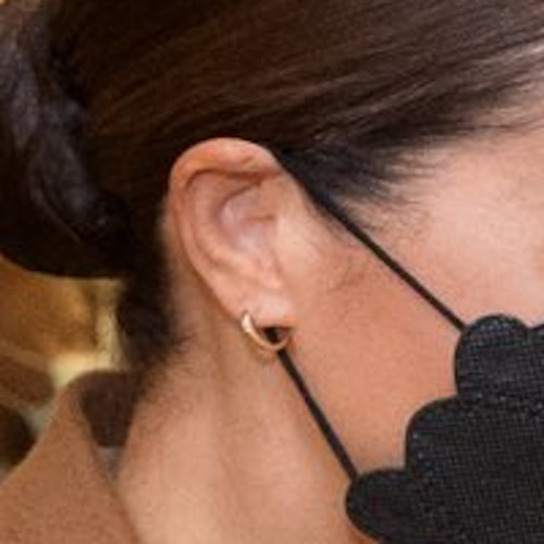 Meghan Markle wears Gold huggie hoop earrings