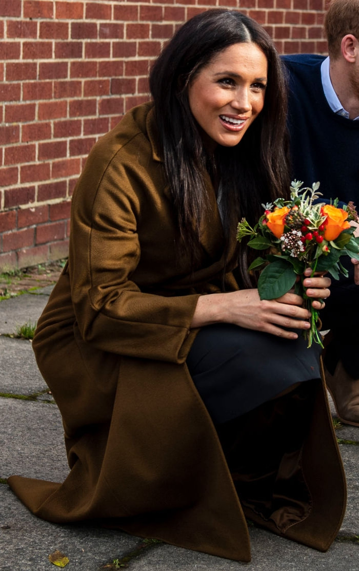 Duchess Meghan Markle wears Olive brown belted coat 