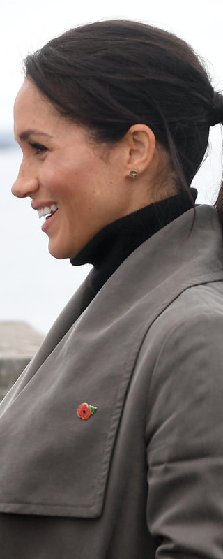 Boh Runga Feather Kiss Gold Discologo Studs as seen on Meghan Markle, the Duchess of Sussex