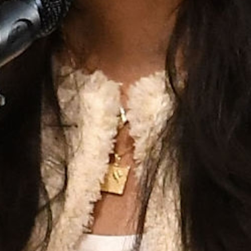 Meghan Markle wears Edge of Ember Kismet Charm Pendant Necklace