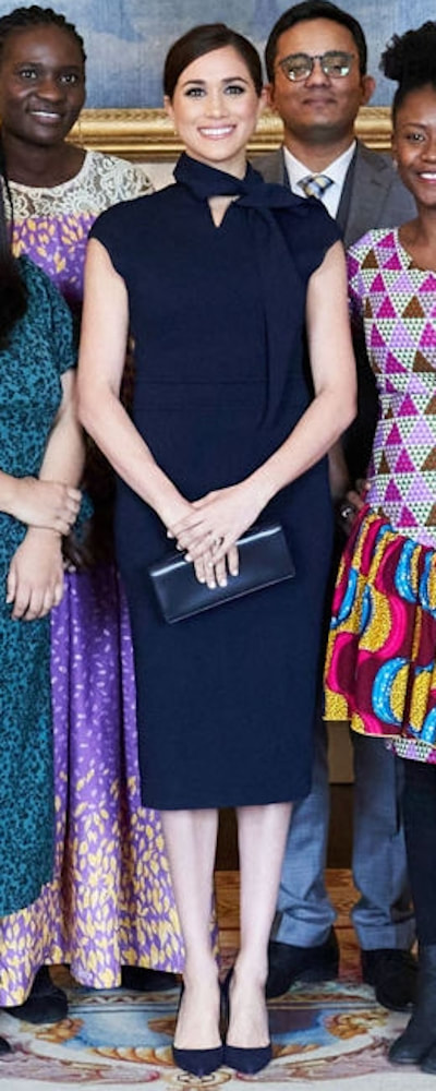 Scanlan Theodore Navy Crepe Knit Cravat Dress as seen on Meghan Markle, the Duchess of Sussex.
