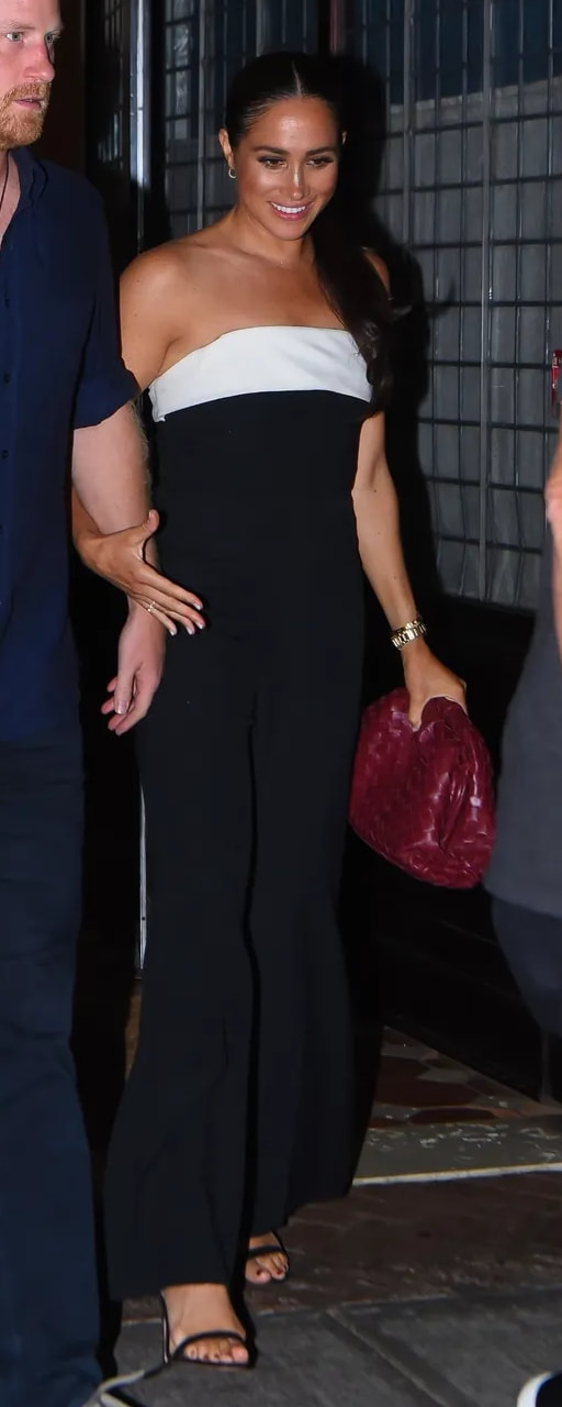 Aquazzura Bow Tie 105 Sandals in Black as seen on Meghan Markle, the Duchess of Sussex.
