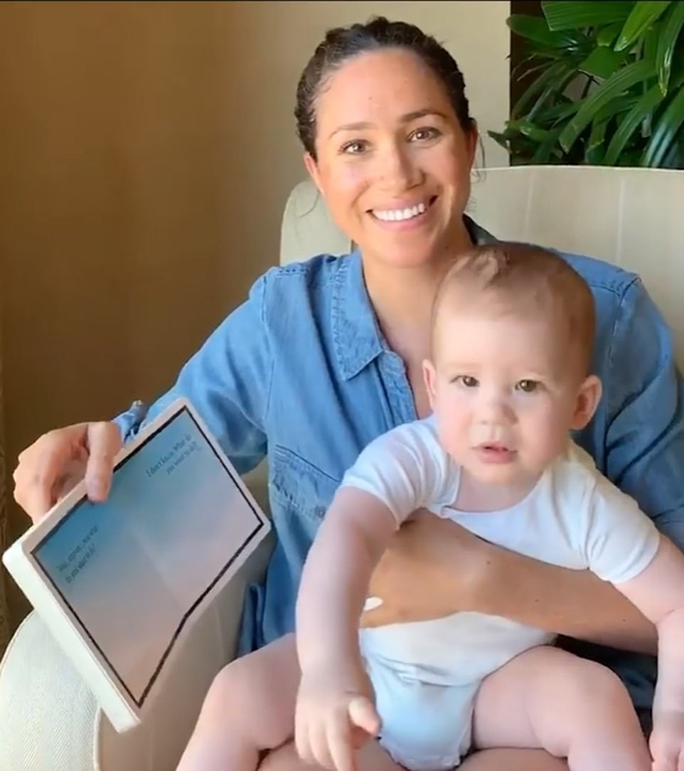 Meghan Markle wears a chambray shirt to read Duck Rabbit to Archie