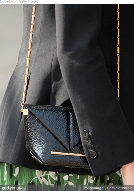 Meghan Markle carries Roland Mouret Mini Classico Bag in Black Patent Leather