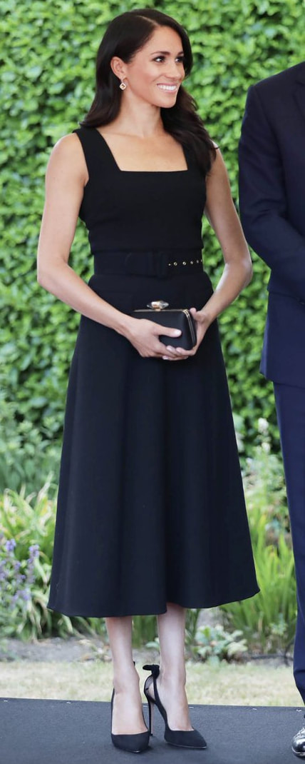 Givenchy Black Satin Clutch With Jewelry Clasp as seen on Meghan Markle, the Duchess of Sussex at Dublin garden party