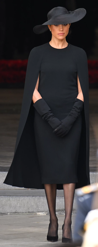 Stella McCartney Cape Dress in Black as seen on Meghan Markle, the Duchess of Sussex