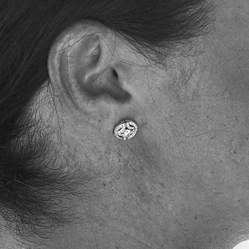 Meghan Markle wears Cartier 'Galanterie' Diamond Stud Earrings for Archie's christening