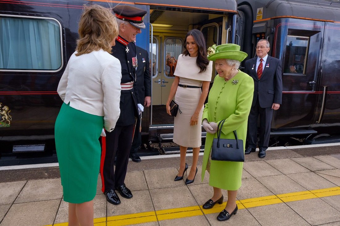 Meghan Markle, the Duchess of Sussex and the Queen arrive in Cheshire by train