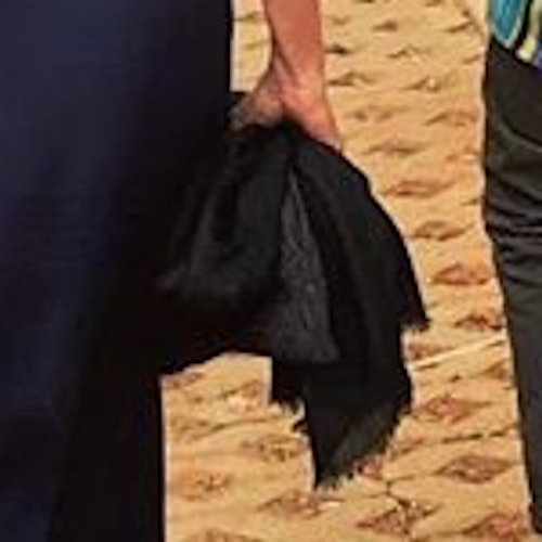 Meghan, Duchess of Sussex carries Cujana lightweight cashmere scarf