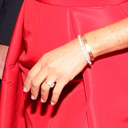 Meghan wears Princess Diana's Diamond Tennis Bracelet and Cartier 'Love' Yellow Gold Bracelet