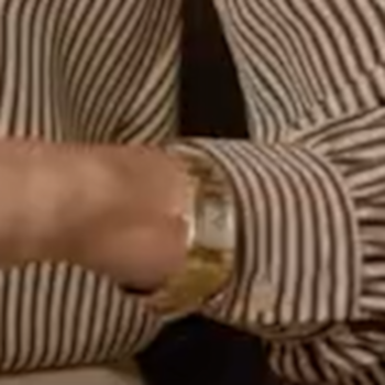 Meghan Markle wears Princess Diana's gold Cartier Tank Française Watch