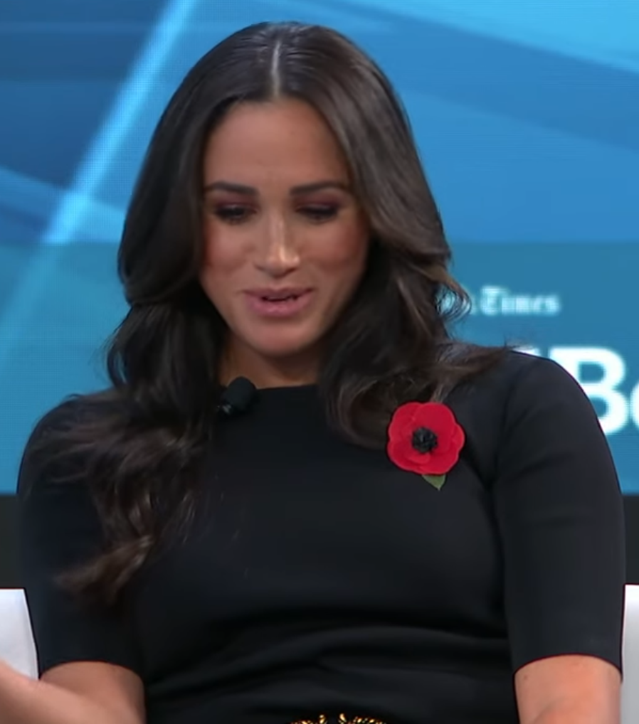 Meghan Markle wears Royal British legion poppy pin in commemoration of Remembrance Day.