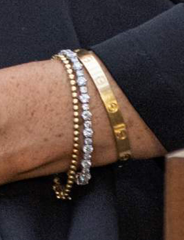 Meghan Markle wears Cartier 'Love' Bracelet, Princess Diana's Diamond Tennis Bracelet, a new Jennifer Meyer gold mini bezel tennis bracelet 