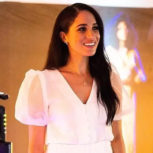 Meghan Markle Duchess of Sussex wears Topshop Ivory Organza Sleeve Button Through Blouse
