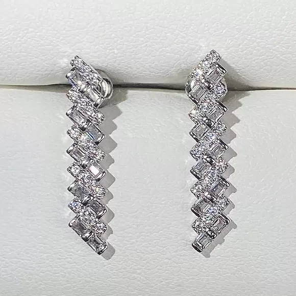 Cartier White Gold Reflection Diamond Earrings - Meghan Markle's ...