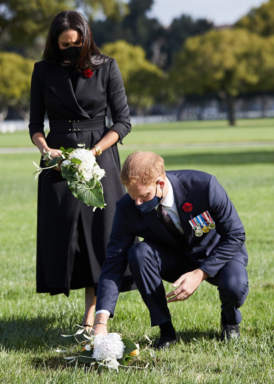Prince Harry and Meghan Markle laid flowers picked from their garden at the gravesites of two Commonwealth soldiers, one who served in the Royal Australian Air Force and one from the Royal Canadian Artillery.